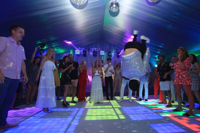 Break dancer on LED dance floor