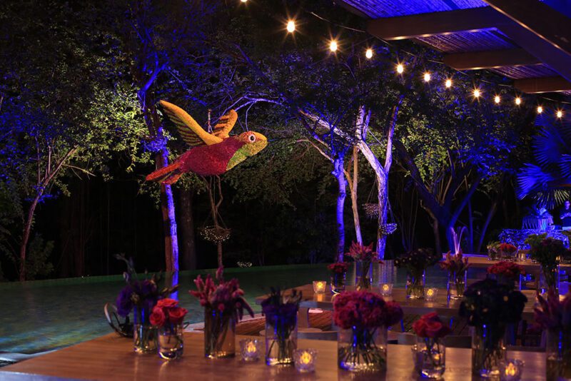 Table décor and hanging hummingbird floral sculpture.