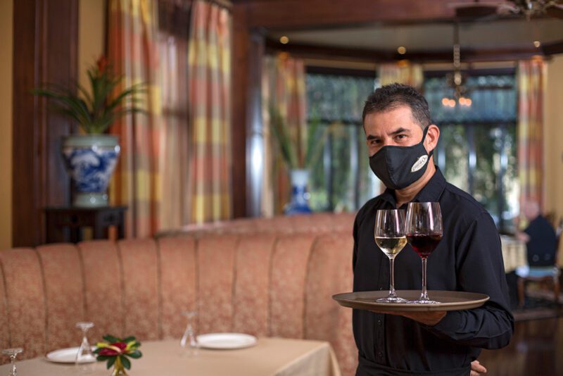 Waiter with face mask, COVID Protocol - Grano de Oro Hotel | Cayuga Collection