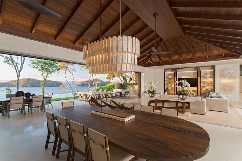 Marble finishes and a seashell inspired chandelier blends with the Golden hour scene. - 8 Monos | Peninsula Papagayo